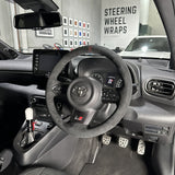 Toyota GR Yaris (2020-2025) Steering Wheel Wrap – Black Alcantara, Black stitch, Red Holo-stripe marker