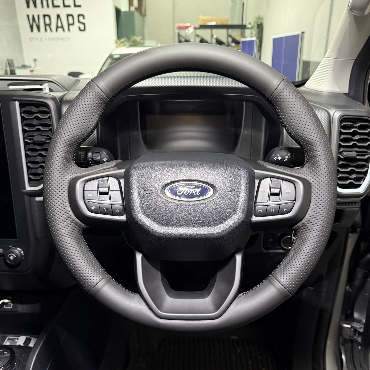 Ford Ranger / Everest Next-Gen (2022+) Steering Wheel Wrap – Black Leather (smooth top, perforated sides), Black stitch