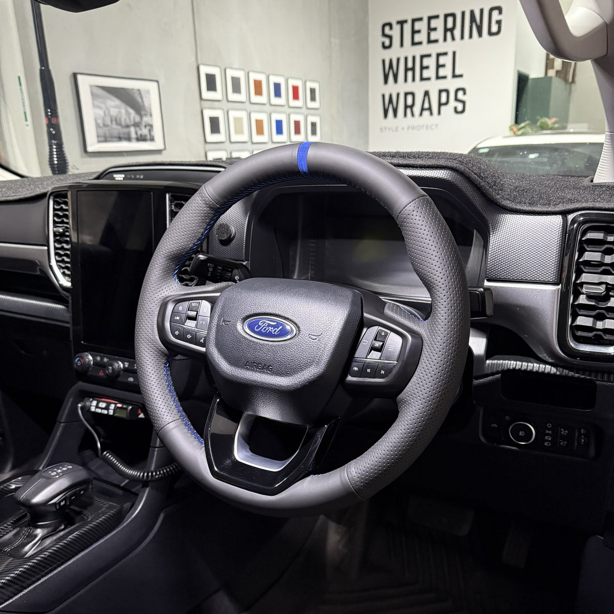 Ford Ranger / Everest Next-Gen (2022+) Steering Wheel Wrap – Black Leather (smooth top, perforated sides), Blue stitch, Blue Alcantara marker