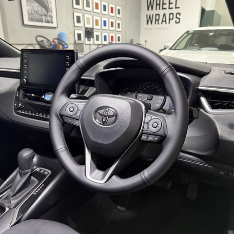 Toyota Corolla / RAV4 (2019+) Steering Wheel Wrap – Black Smooth Leather, Black stitch