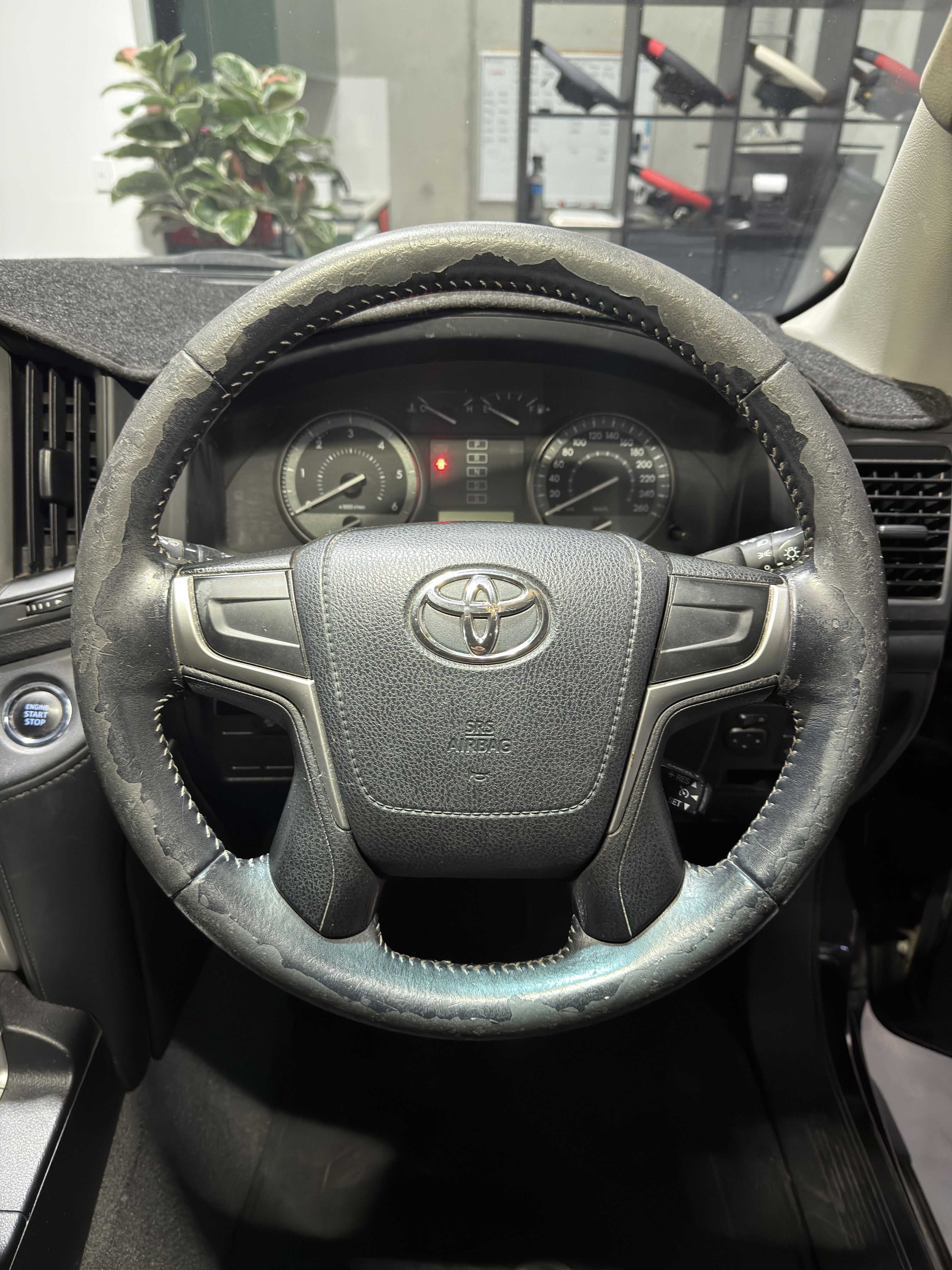 Peeling steering wheel close up