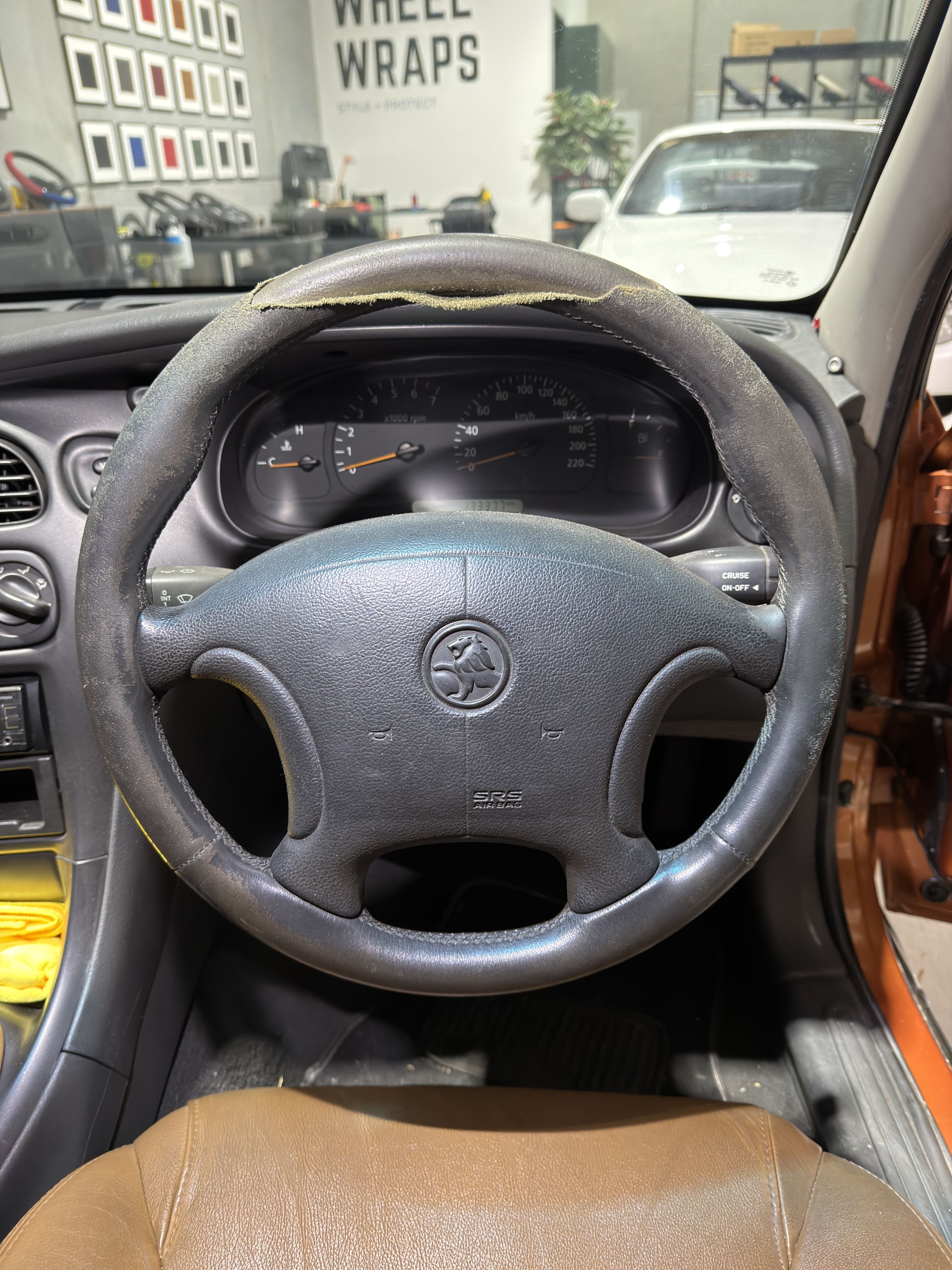 Peeling steering wheel damage