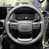 Toyota Prado 250 Series (2024+) Steering Wheel Wrap – Black Leather (smooth top, perforated sides), Grey stitch