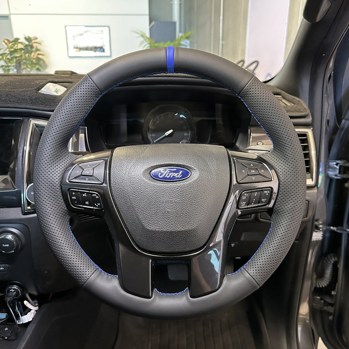 Ford Ranger PX2/PX3 / Everest (2015–2022) Steering Wheel Wrap – Black Leather (smooth top, perforated sides), Blue Stitch, Blue Marker