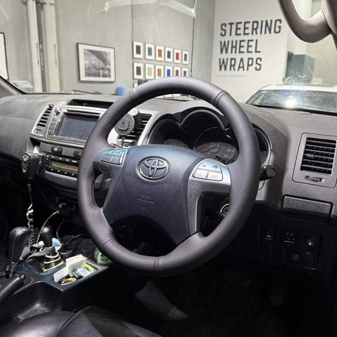 Toyota HiLux 7th Gen (2005–2015) Steering Wheel Wrap – Black Smooth Leather, Black stitch