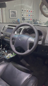 Toyota HiLux 7th Gen (2005–2015) Steering Wheel Wrap – Black Smooth Leather, Black stitch