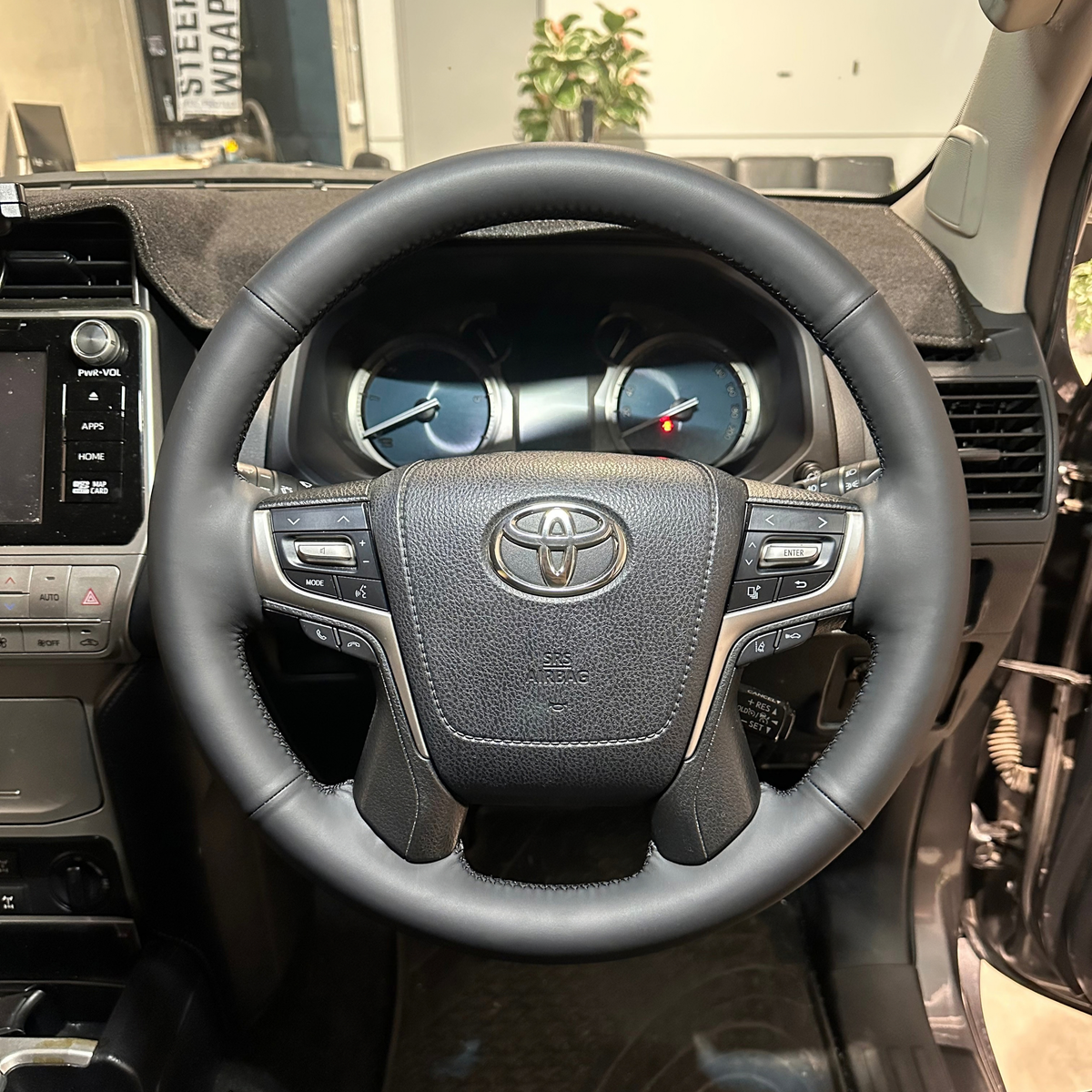 Toyota LandCruiser 200 Series Steering Wheel Wrap – Black Smooth Leather, Black stitch